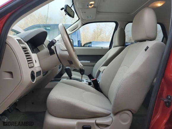 2010 Mercury Mariner with VIN 4M2CN9BG7AKJ23405, listed as a Copart auction lot 84254994 with 71,705 mi miles and Salvage Title. Bid and sale history available at carsss.com. Image 7.