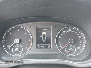 2013 Volkswagen Passat SEL Premium z VIN 1VWCN7A39DC058142, wystawiony jako IAAI lot #42369150 z przebiegiem 127 302 mil mil oraz . Historia ofert i sprzedaży dostępna na DreamBid. Obrazek 7.