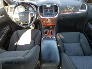2012 Chrysler 300 with VIN 2C3CCAAG9CH201079, listed as a Copart auction lot 80343504 with 137,593 mi miles and Salvage Title. Bid and sale history available at DreamBid. Image 8.