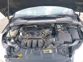 2014 Ford Focus SE with VIN 1FADP3F21EL157488, listed as a IAAI auction lot 42120325 with 198,658 mi miles and . Bid and sale history available at DreamBid. Image 10.