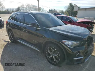 2016 BMW X1 xDrive28i z VIN WBXHT3C35G5E50005, wystawiony jako Copart lot #74476533 z przebiegiem 128 031 mil mil oraz Szkoda całkowita • Salvage title. Historia ofert i sprzedaży dostępna na DreamBid. Obrazek 4.