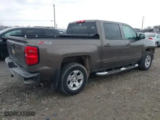 2015 Chevrolet Silverado 1500 LT with VIN 3GCUKREC4FG237341, listed as a IAAI auction lot 41813464 with 108,751 mi miles. Bid and sale history available at carsss.com. Image 4.