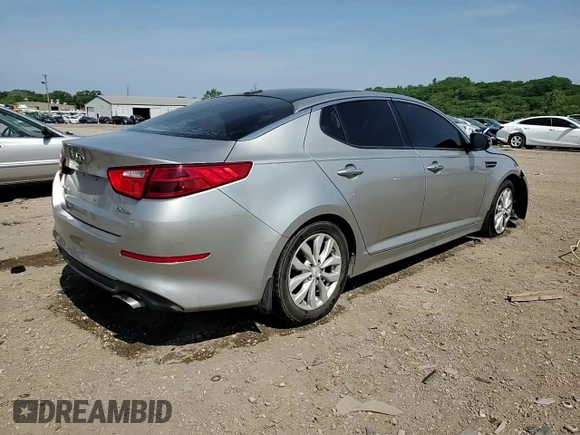 2015 Kia Optima EX с VIN 5XXGN4A71FG385837, выставлен на аукционе Copart как лот 60113905 с пробегом 172 274 миль миль и Списание • Salvage title. История ставок и продаж доступна на DreamBid. Изображение 13.