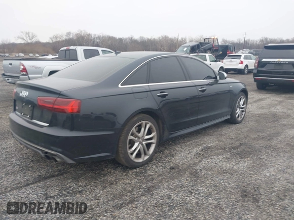 2016 Audi S6 Prestige z VIN WAUH2AFC4GN177293, wystawiony jako IAAI lot #41549559 z przebiegiem 79 715 mil mil oraz . Historia ofert i sprzedaży dostępna na DreamBid. Obrazek 4.