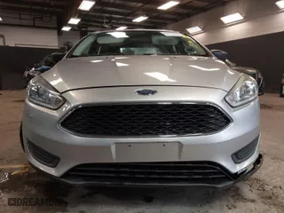 2016 Ford Focus S with VIN 1FADP3E22GL390039, listed as a IAAI auction lot 41958137 with 83,411 mi miles. Bid and sale history available at carsss.com. Image 12.