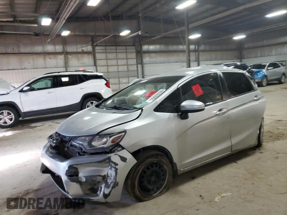 2015 Honda Fit LX with VIN 3HGGK5H53FM748495, listed as a Copart auction lot 86590994 with 124,000 mi miles and Salvage Title. Bid and sale history available at carsss.com. Image 1.