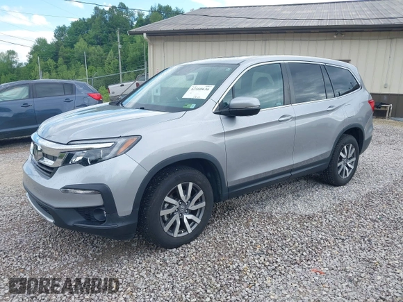 2021 Honda Pilot EX-L with VIN 5FNYF6H50MB063465, listed as a IAAI auction lot 42160636 with 28,595 mi miles and . Bid and sale history available at DreamBid. Image 2.