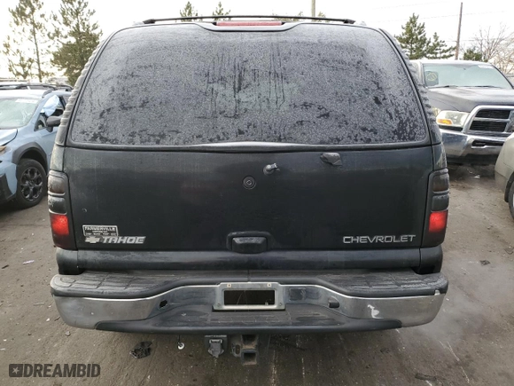 2005 Chevrolet Tahoe Z71 with VIN 1GNEC13T75R112216, listed as a Copart auction lot 84390314 with 242,754 mi miles and Clean Title. Bid and sale history available at carsss.com. Image 6.