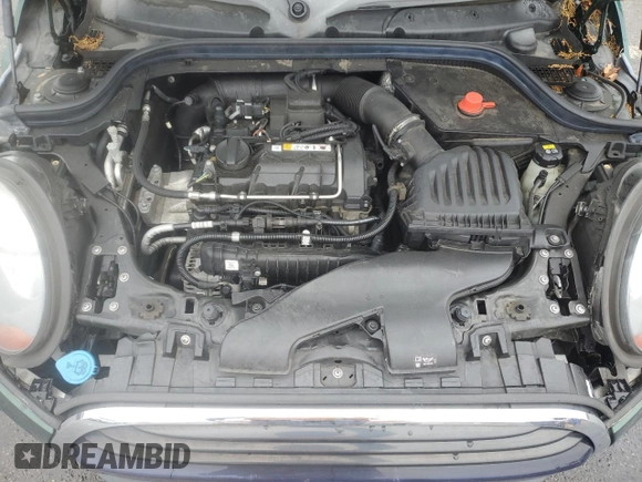 2017 MINI Hardtop Cooper with VIN WMWXP5C55H2D16587, listed as a Copart auction lot 60855195 with 77,769 mi miles and Salvage title. Bid and sale history available at DreamBid. Image 11.