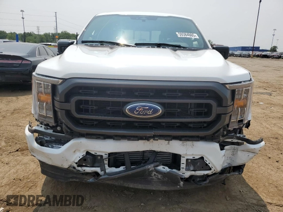 2023 Ford F-150 XL with VIN 1FTEW1EP7PFB66555, listed as a Copart auction lot 59384665 with 28,495 mi miles and Salvage title. Bid and sale history available at DreamBid. Image 5.