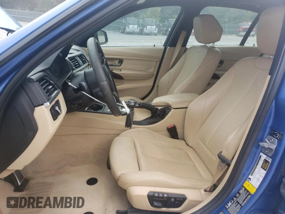 2015 BMW 3 Series 328i xDrive with VIN WBA3B5G50FNS12329, listed as a Copart auction lot 62928215 with 146,562 mi miles and Salvage title. Bid and sale history available at DreamBid. Image 7.