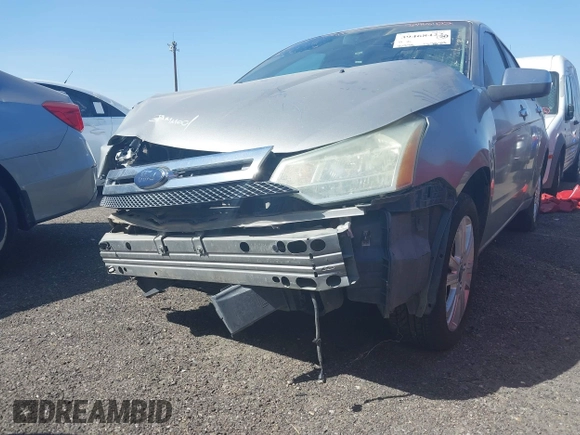 2008 Ford Focus SE with VIN 1FAHP35N88W242103, listed as a IAAI auction lot 39468422 with 169,911 mi miles. Bid and sale history available at carsss.com. Image 13.