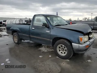 1994 Toyota T100 DX with VIN JT4VD10A6R0017701, listed as a Copart auction lot 46034975 with 219,651 mi miles and Salvage Title. Bid and sale history available at DreamBid. Image 4.