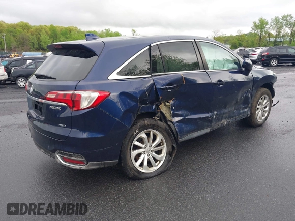 2018 Acura RDX Technology with VIN 5J8TB4H54JL027668, listed as a IAAI auction lot 41390375 with 163,198 mi miles and . Bid and sale history available at carsss.com. Image 4.