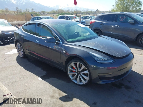 2018 Tesla Model 3 Long Range Battery with VIN 5YJ3E1EBXJF055203, listed as a IAAI auction lot 42019770 with 57,379 mi miles and . Bid and sale history available at DreamBid. Image 1.