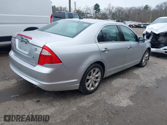 2011 Ford Fusion SEL with VIN 3FAHP0CG7BR170341, listed as a IAAI auction lot 42034192 with 128,279 mi miles. Bid and sale history available at carsss.com. Image 4.