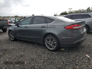 2017 Ford Fusion Hybrid SE with VIN 3FA6P0LU1HR216557, listed as a Copart auction lot 61540425 with 172,438 mi miles and Clean title. Bid and sale history available at DreamBid. Image 2.