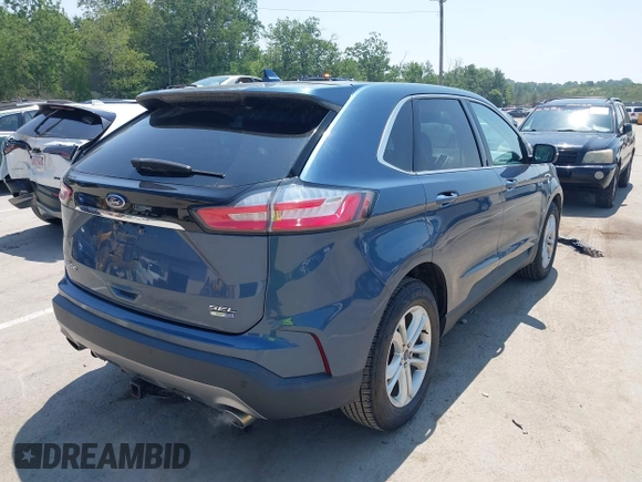 2019 Ford Edge SEL with VIN 2FMPK4J95KBB47327, listed as a IAAI auction lot 42765430 with 97,129 mi miles and . Bid and sale history available at DreamBid. Image 4.