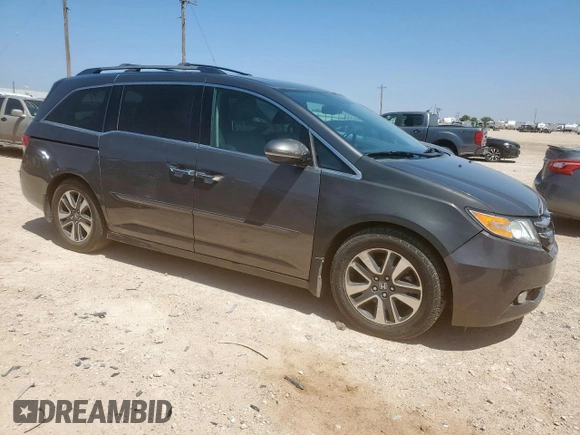 2015 Honda Odyssey Touring Elite z VIN 5FNRL5H97FB002739, wystawiony jako Copart lot #62060695 z przebiegiem 194 604 mil mil oraz Szkoda całkowita • Salvage title. Historia ofert i sprzedaży dostępna na DreamBid. Obrazek 4.