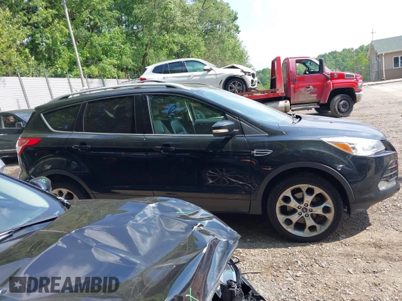 2016 Ford Escape Titanium with VIN 1FMCU9JX1GUC18335, listed as a IAAI auction lot 42396492 with 147,522 mi miles and . Bid and sale history available at DreamBid. Image 13.