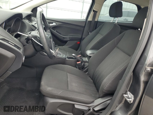 2016 Ford Focus SE z VIN 1FADP3F23GL405565, wystawiony jako Copart lot #60173935 z przebiegiem 82 167 mil mil oraz Szkoda całkowita • Salvage title. Historia ofert i sprzedaży dostępna na DreamBid. Obrazek 7.