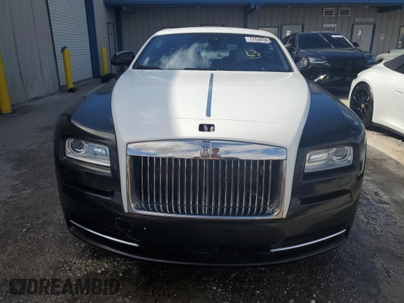 2014 Rolls-Royce Wraith z VIN SCA665C59EUX84411, wystawiony jako Copart lot #74548964 z przebiegiem Nie podano mil oraz Nie do naprawy. Historia ofert i sprzedaży dostępna na DreamBid. Obrazek 5.