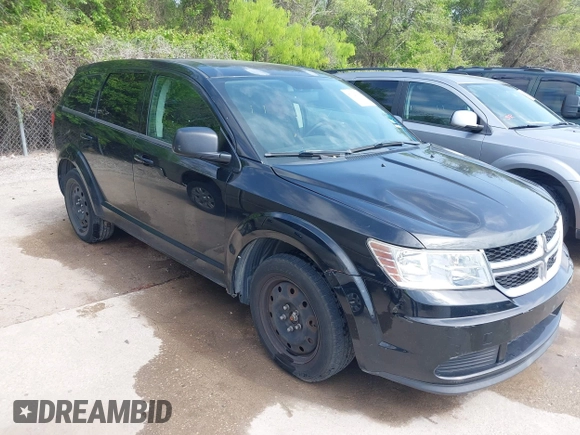 2014 Dodge Journey SE with VIN 3C4PDCABXET235827, listed as a IAAI auction lot 41927966 with 186,179 mi miles and . Bid and sale history available at carsss.com. Image 1.