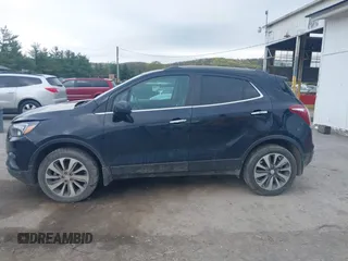 2021 Buick Encore Preferred with VIN KL4CJESBXMB331159, listed as a IAAI auction lot 42049200 with 95,379 mi miles and . Bid and sale history available at DreamBid. Image 14.