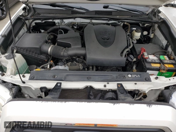 2017 Toyota Tacoma SR5 z VIN 3TMAZ5CN8HM040978, wystawiony jako Copart lot #58813575 z przebiegiem 103 730 mil mil oraz Nie do naprawy • Non repairable. Historia ofert i sprzedaży dostępna na DreamBid. Obrazek 11.