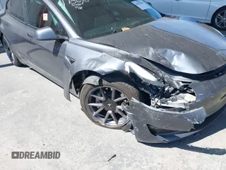 2023 Tesla Model 3 z VIN 5YJ3E1EA5PF639346, wystawiony jako IAAI lot #41896608 z przebiegiem 25 618 mil mil oraz . Historia ofert i sprzedaży dostępna na DreamBid. Obrazek 6.