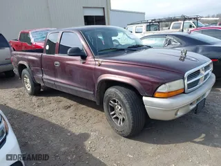 2004 Dodge Dakota SLT with VIN 1D7GL42K14S565403, listed as a IAAI auction lot 41439288 with 235,421 mi miles. Bid and sale history available at carsss.com. Image 1.
