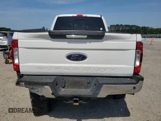 2019 Ford F-250 XL with VIN 1FT7W2BT4KED34411, listed as a Copart auction lot 54476875 with 185,274 mi miles and Salvage title. Bid and sale history available at DreamBid. Image 6.