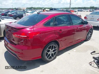 2016 Ford Focus SE z VIN 1FADP3F28GL237888, wystawiony jako IAAI lot #42564140 z przebiegiem 143 210 mil mil oraz . Historia ofert i sprzedaży dostępna na DreamBid. Obrazek 4.