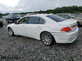 2004 BMW 7 Series 745Li with VIN WBAGN63494DS47871, listed as a Copart auction lot 60128164 with 0 mi miles and Salvage Title. Bid and sale history available at carsss.com. Image 2.