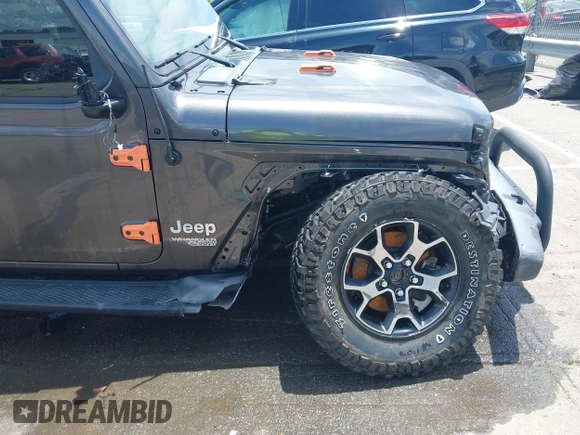 2019 Jeep Wrangler Unlimited Sport S with VIN 1C4HJXDN4KW577273, listed as a IAAI auction lot 42435847 with 69,403 mi miles and . Bid and sale history available at DreamBid. Image 6.