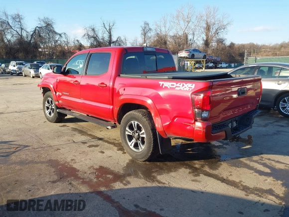 2018 Toyota Tacoma SR with VIN 3TMCZ5ANXJM154305, listed as a IAAI auction lot 41557497 with 182,624 mi miles and . Bid and sale history available at DreamBid. Image 3.