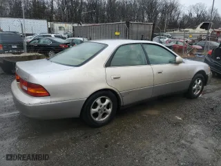 1999 Lexus ES 300 Luxury Sport Sdn with VIN JT8BF28GXX5067205, listed as a Copart auction lot 83018394 with 170,573 mi miles and Salvage Title. Bid and sale history available at carsss.com. Image 3.