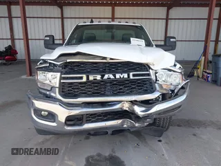 2023 Ram 2500 with VIN 3C7WR5AJ7PG567772, listed as a IAAI auction lot 42180314 with 48,197 mi miles and . Bid and sale history available at DreamBid. Image 12.
