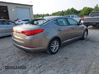 2013 Kia Optima LX z VIN 5XXGM4A79DG200479, wystawiony jako IAAI lot #42412641 z przebiegiem 183 916 mil mil oraz . Historia ofert i sprzedaży dostępna na DreamBid. Obrazek 4.