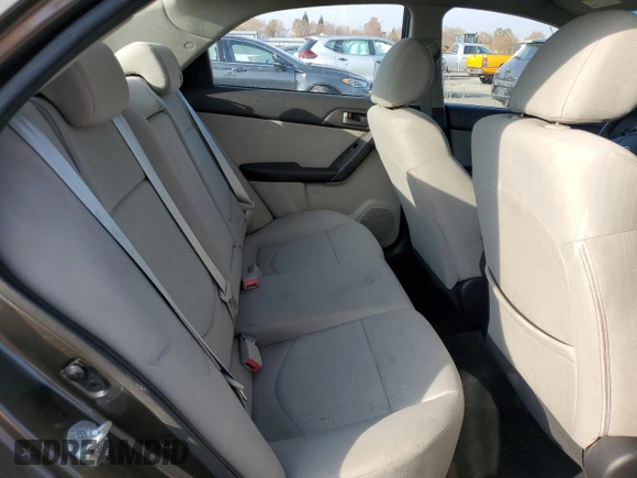 2010 Kia Forte EX z VIN KNAFU4A29A5144394, wystawiony jako Copart lot #82932164 z przebiegiem 114 510 mil mil oraz Czysty tytuł • Clean title. Historia ofert i sprzedaży dostępna na DreamBid. Obrazek 10.