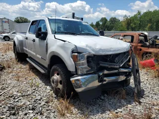 2022 Ford F-350 XL with VIN 1FT8W3DT5NEF78807, listed as a Copart auction lot 65336664 with 197,215 mi miles and Salvage Title. Bid and sale history available at DreamBid. Image 4.