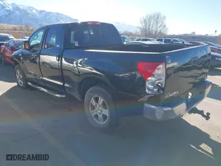 2007 Toyota Tundra SR5 with VIN 5TFBV54127X011965, listed as a IAAI auction lot 41670795 with 156,864 mi miles. Bid and sale history available at carsss.com. Image 3.
