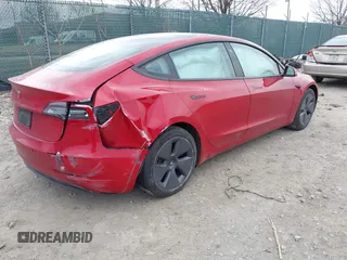 2022 Tesla Model 3 with VIN 5YJ3E1EA3NF333128, listed as a IAAI auction lot 41719743 with Not Provided miles. Bid and sale history available at carsss.com. Image 4.