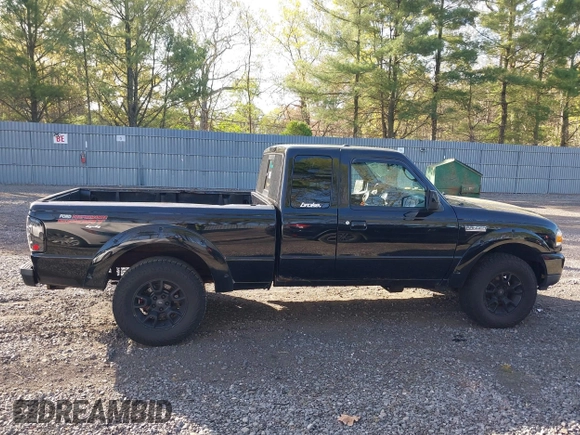 2011 Ford Ranger XLT with VIN 1FTLR4FE9BPB07796, listed as a IAAI auction lot 42128597 with 235,512 mi miles. Bid and sale history available at carsss.com. Image 14.