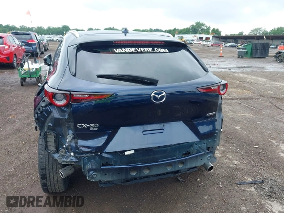 2022 Mazda CX-30 S Premium with VIN 3MVDMBDL0NM413545, listed as a IAAI auction lot 42493594 with 57,013 mi miles and . Bid and sale history available at DreamBid. Image 17.