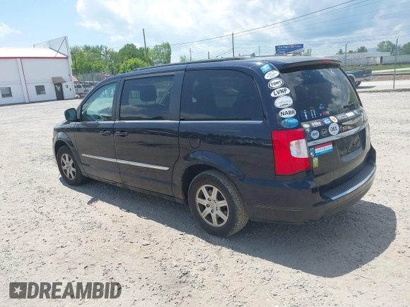 2011 Chrysler Town & Country Touring with VIN 2A4RR5DG7BR697932, listed as a IAAI auction lot 42231254 with 151,866 mi miles and . Bid and sale history available at DreamBid. Image 3.