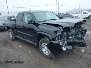 2022 Toyota Tacoma SR with VIN 3TYSX5EN4NT014577, listed as a IAAI auction lot 41864507 with 14,879 mi miles and . Bid and sale history available at DreamBid. Image 1.