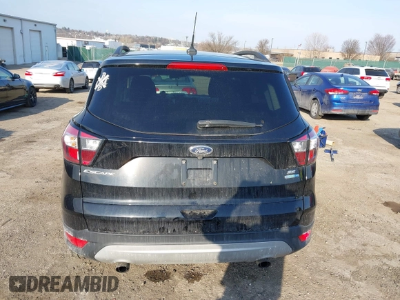 2018 Ford Escape SE z VIN 1FMCU9GD9JUC25456, wystawiony jako IAAI lot #41721436 z przebiegiem 55 642 mil mil oraz . Historia ofert i sprzedaży dostępna na DreamBid. Obrazek 17.