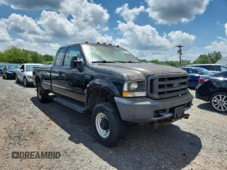 2004 Ford F-250 XL with VIN 1FTNX21L64EA61870, listed as a Copart auction lot 63971805 with 202,804 mi miles and Clean title. Bid and sale history available at DreamBid. Image 4.