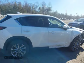 2019 Mazda CX-5 Grand Touring with VIN JM3KFBDM2K0672720, listed as a IAAI auction lot 41751196 with 51,632 mi miles and . Bid and sale history available at carsss.com. Image 13.